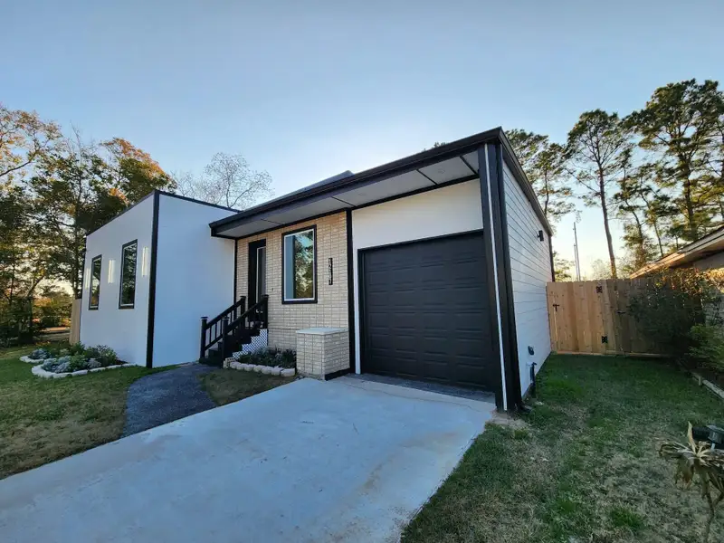 Exterior details and patio area of a home in , Houston (Image 2). Exterior details and patio area of a home in , Houston (Image 2).