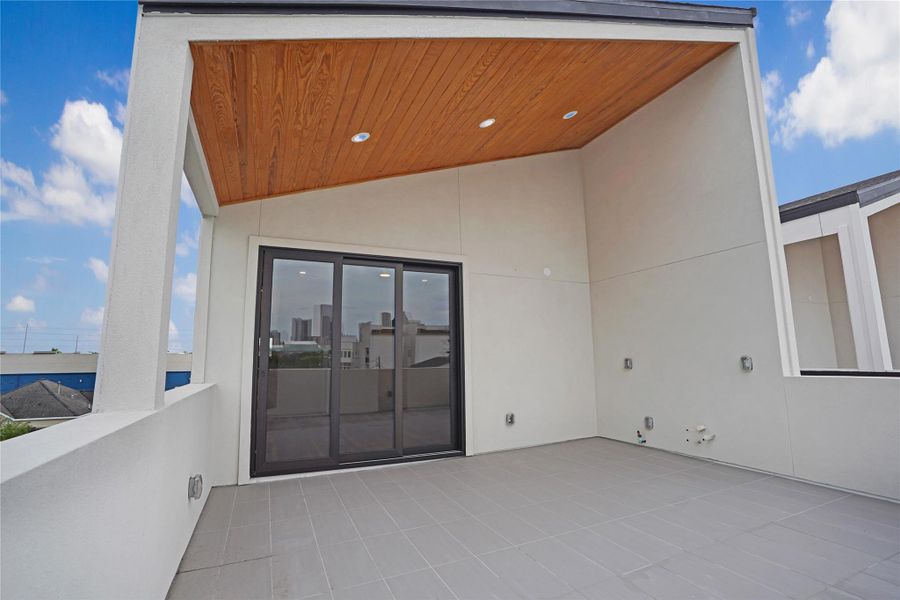 Exterior details and patio area of a home in , Houston (Image 32).