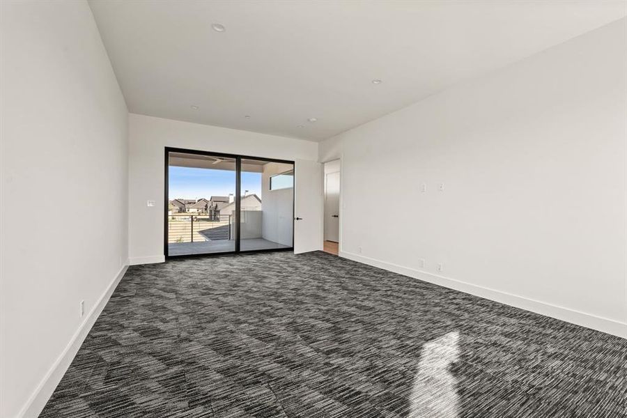 Upstairs flex room with balcony access. Upstairs flex room with balcony access.