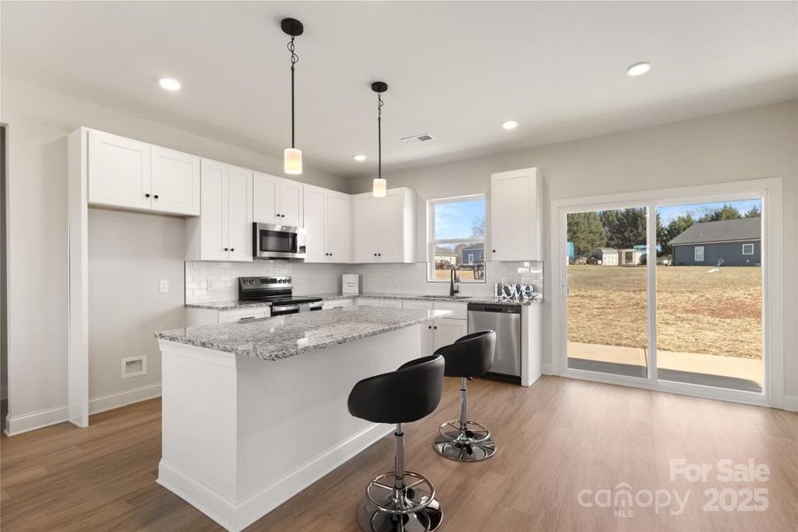 Furnished interior view inside a new home in , Olin (Image 8).