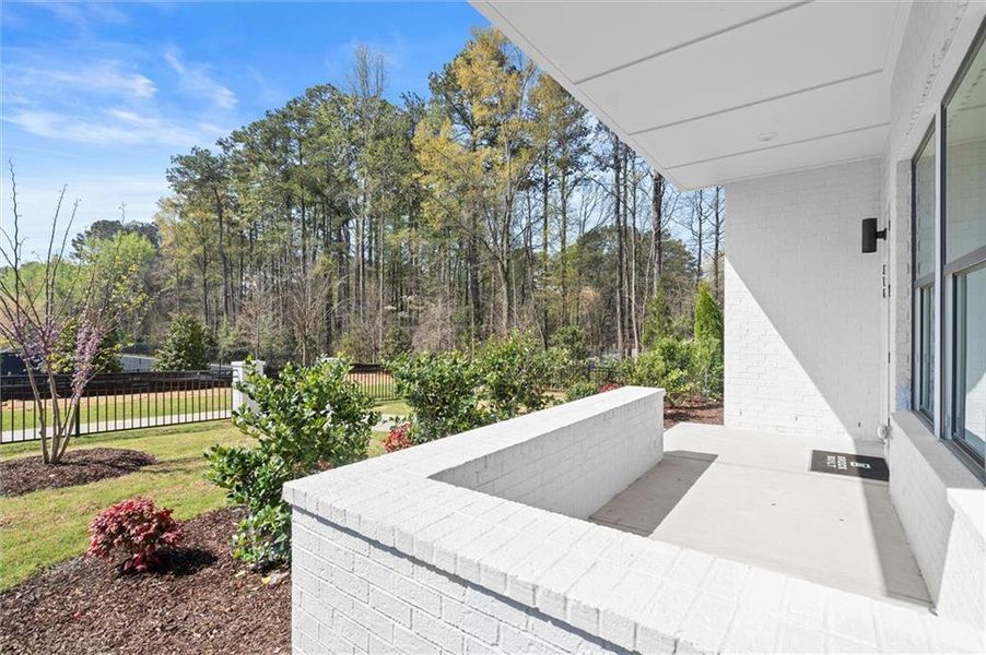 Exterior details and patio area of a home in The Gathering – Alpharetta, Alpharetta (Image 27).