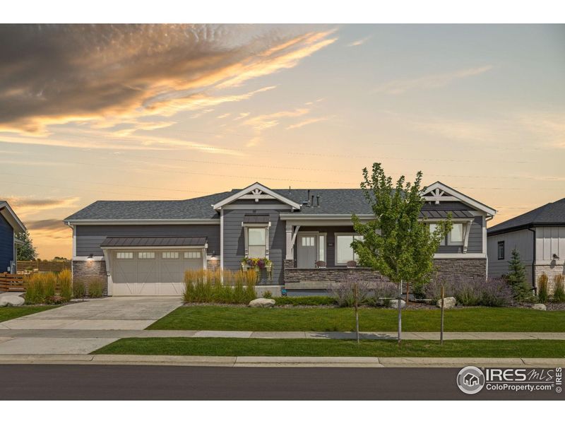 Front exterior of a new home in , Erie, CO, highlighting curb appeal (Image 18).