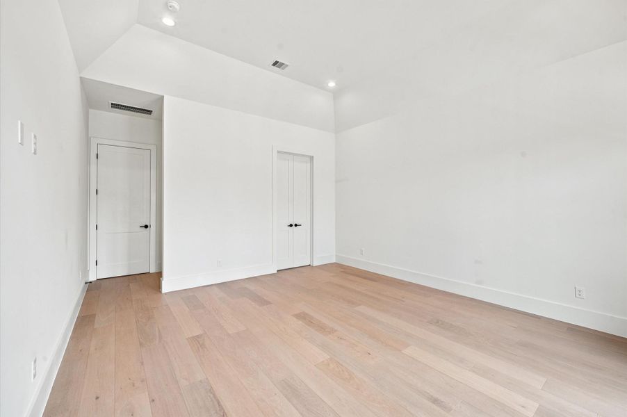 Another view of the primary bedroom.