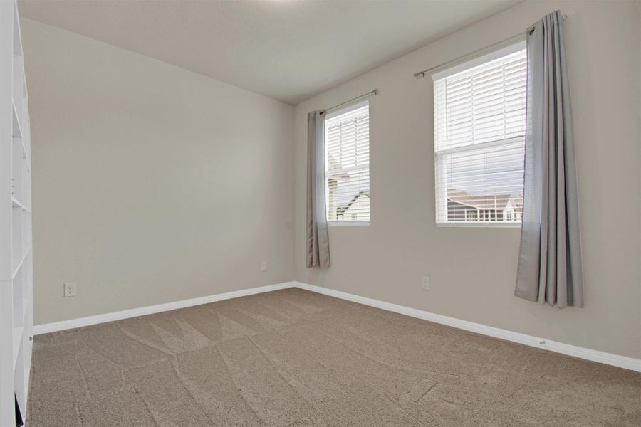 Spacious, unfurnished interior of a new home in The Cottages at Lariat, Liberty Hill (Image 11).