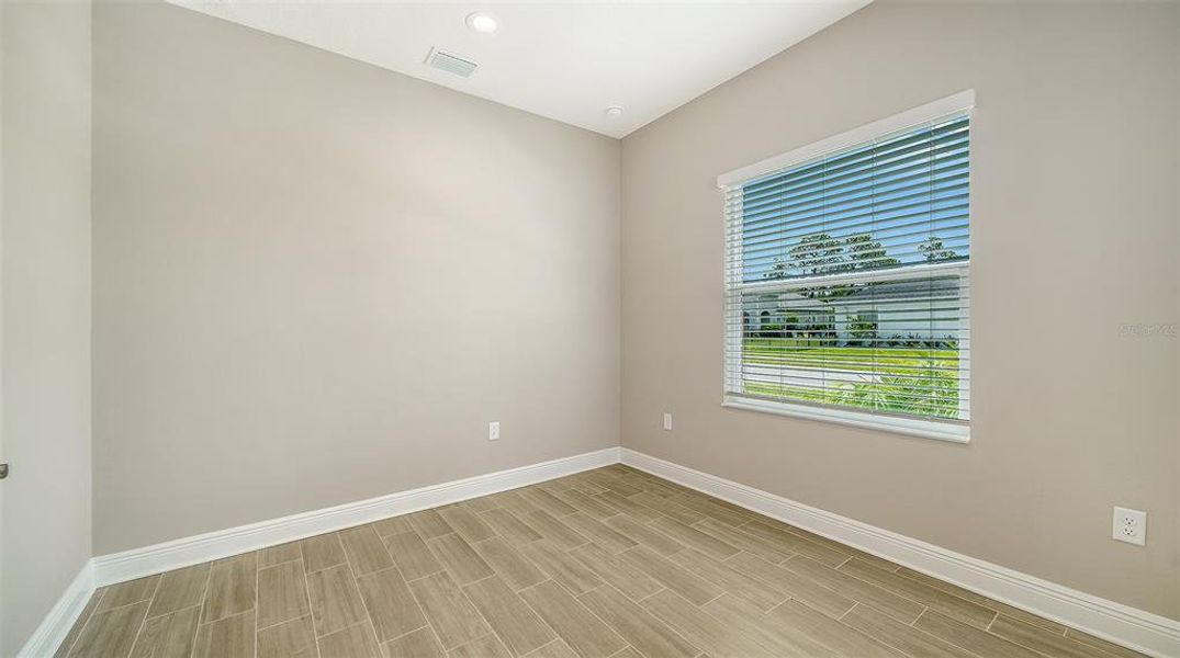 Spacious, unfurnished interior of a new home in Wildleaf at North River Ranch, Parrish (Image 25).