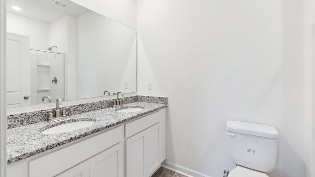 Representative furnished interior of a home built from the Freeport by D.R. Horton in The Hideaway at Fox Meadows, Bluff City (Image 6).
