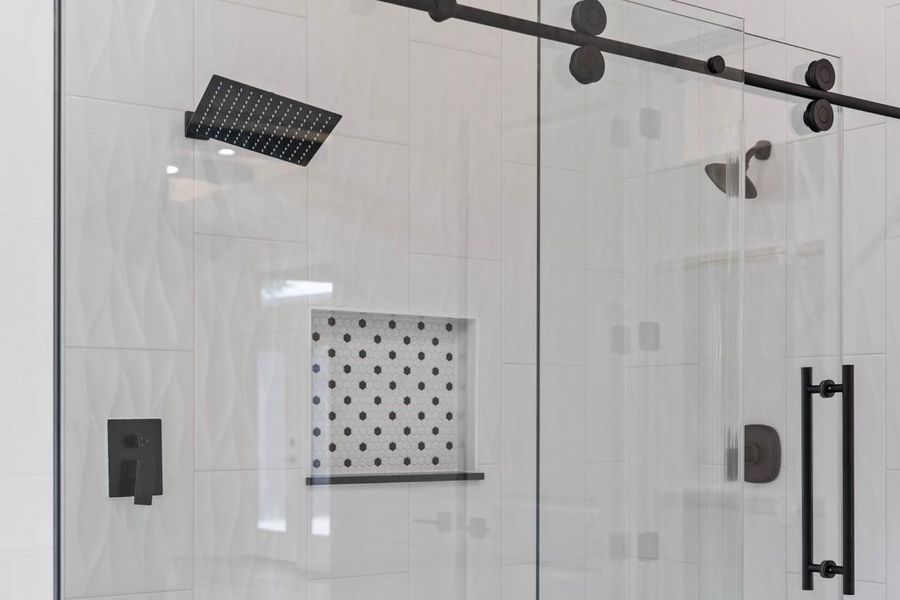 Double shower head and little niche. Double shower head and little niche.