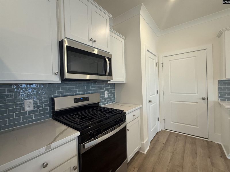 Furnished interior view inside a new home in Cottages at Roofs Pond, West Columbia (Image 4).