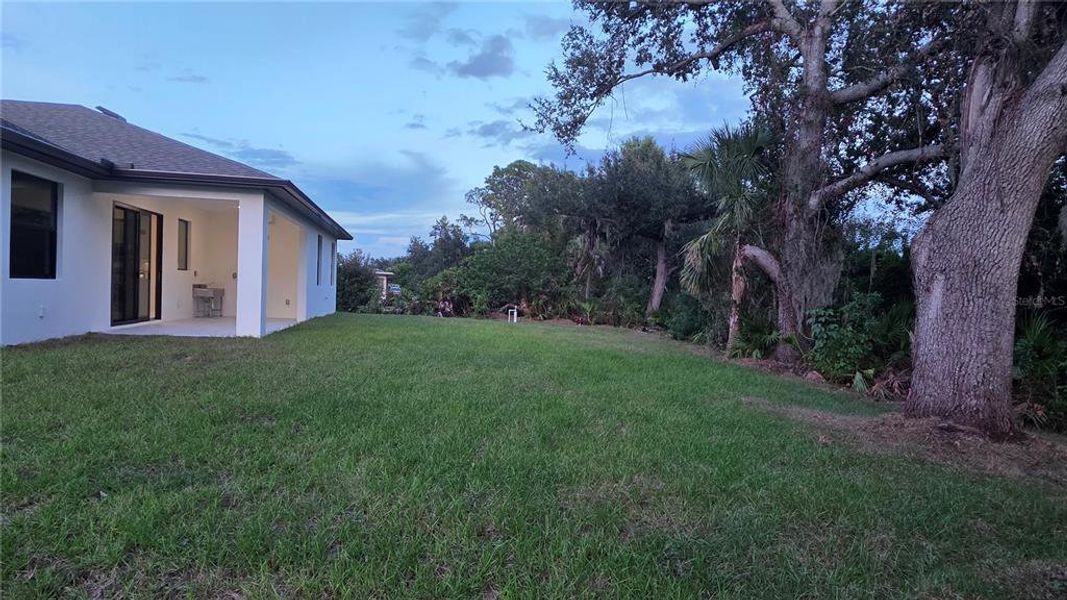 Exterior details and patio area of a home in , North Port (Image 39).
