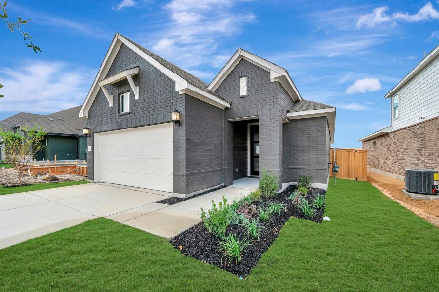 Front exterior of a new home in Mayfair - Select Garden Series, New Braunfels, TX, highlighting curb appeal (Image 2).