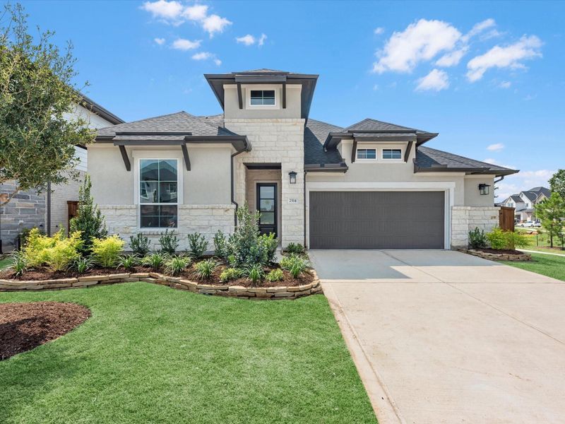 Front exterior of a new home in Tompkins Reserve, Katy, TX, highlighting curb appeal (Image 2).