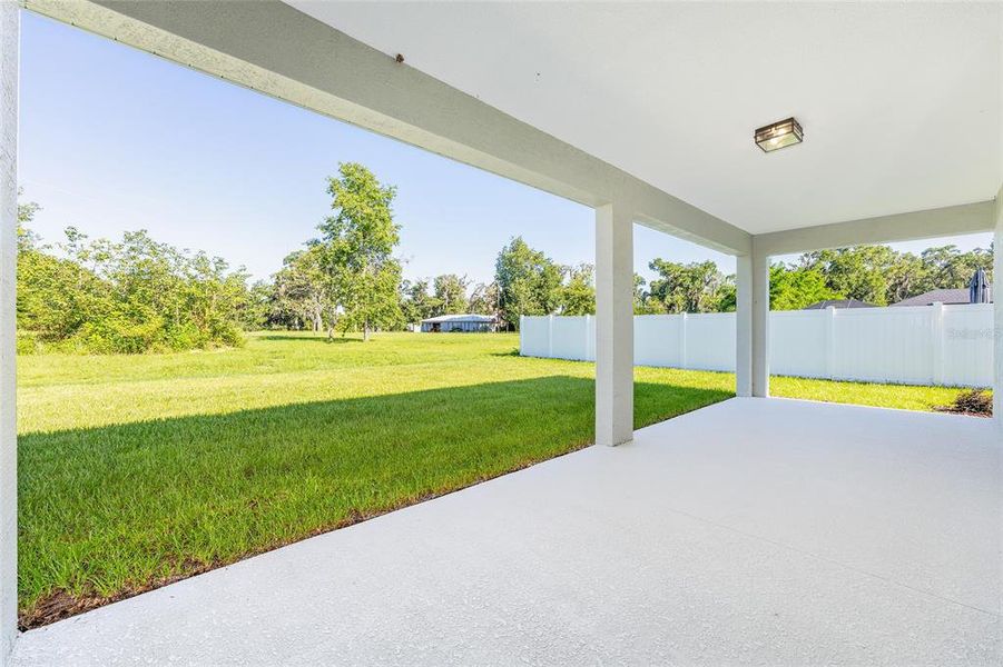 Exterior details and patio area of a home in Evergreen Estates, Ocala (Image 3).