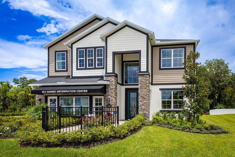 Front exterior of a new home in Estates at Rivercrest, Sanford, FL, highlighting curb appeal (Image 1). Front exterior of a new home in Estates at Rivercrest, Sanford, FL, highlighting curb appeal (Image 1).