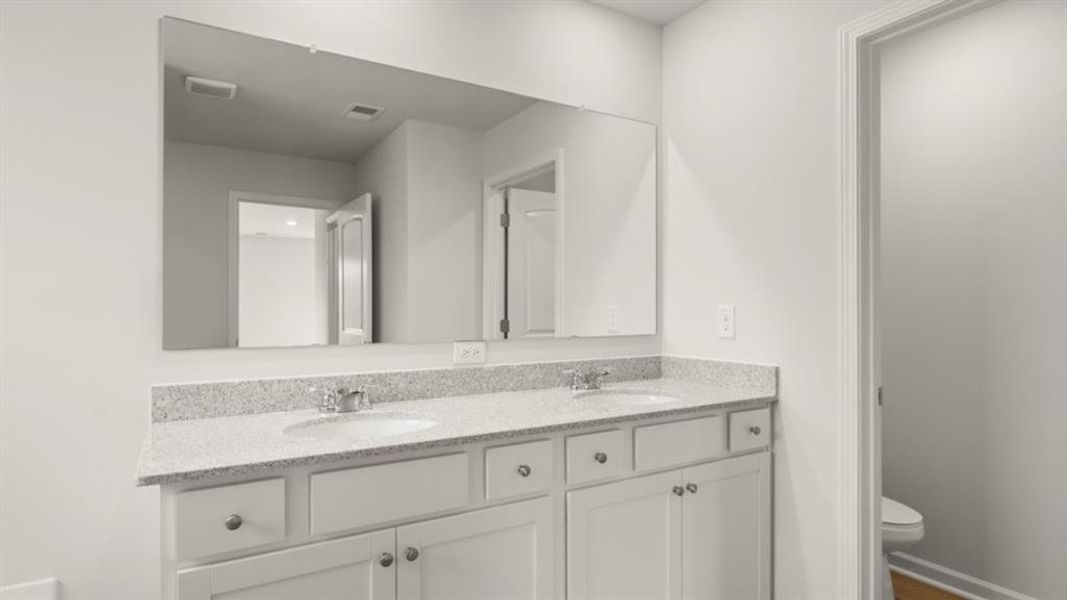 Furnished interior view inside a new home in Fairway 17 at Mirror Lake, Villa Rica (Image 7).