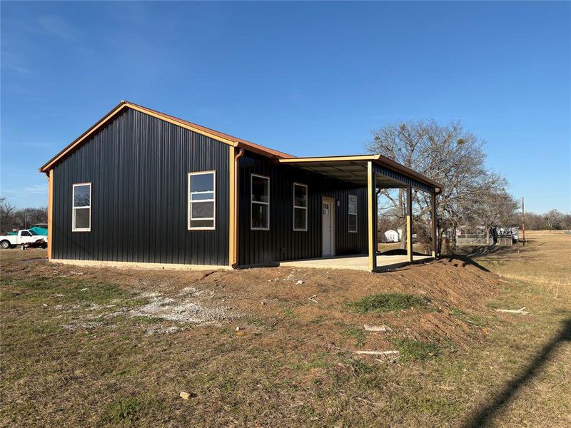 Exterior details and patio area of a home in , Quitman (Image 8).