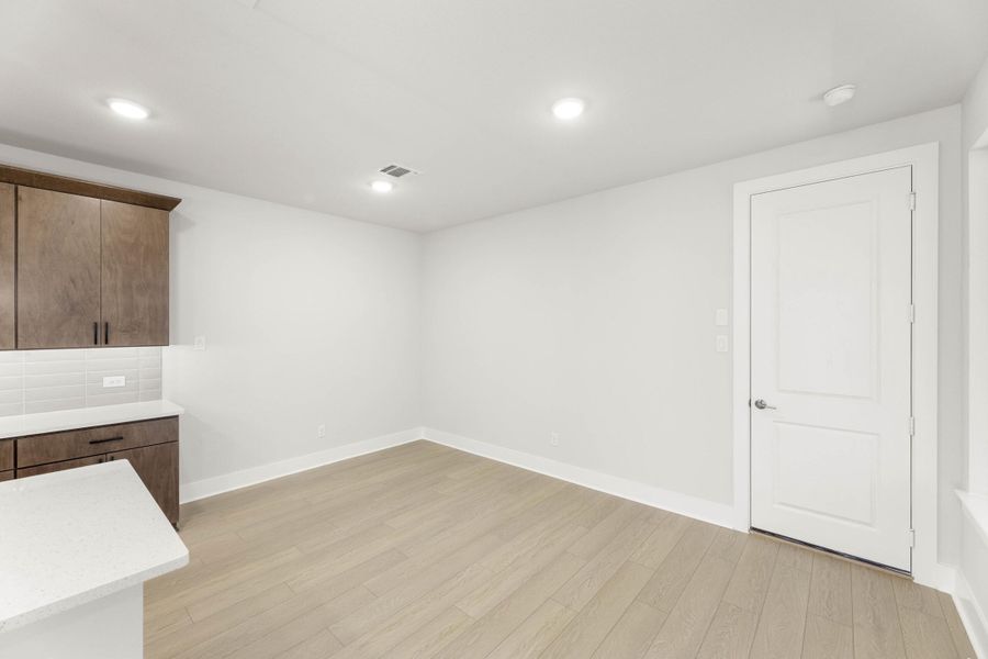 Spacious, unfurnished interior of a new home in Terrace Collection at Harvest, Argyle (Image 16).