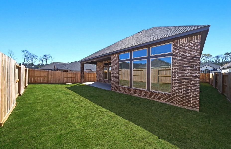 Exterior details and patio area of a home in The Highlands 55′, Porter (Image 4).