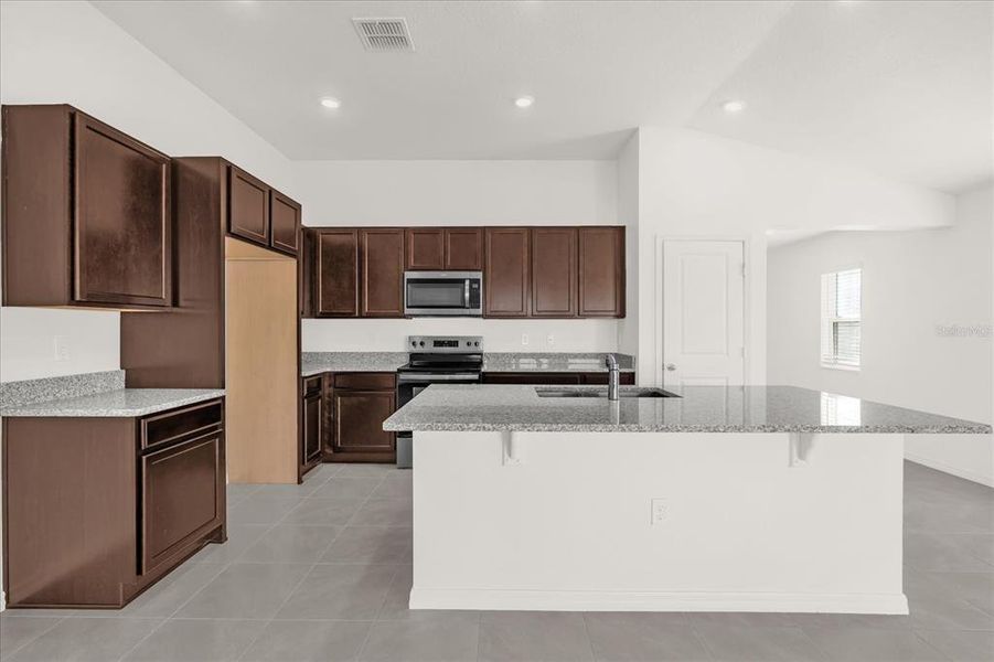 Furnished interior view inside a new home in Robins Run, Lake Wales (Image 8).