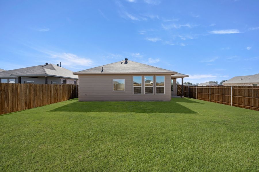 Exterior details and patio area of a home in Baker Farms, Cleburne (Image 4). Exterior details and patio area of a home in Baker Farms, Cleburne (Image 4).