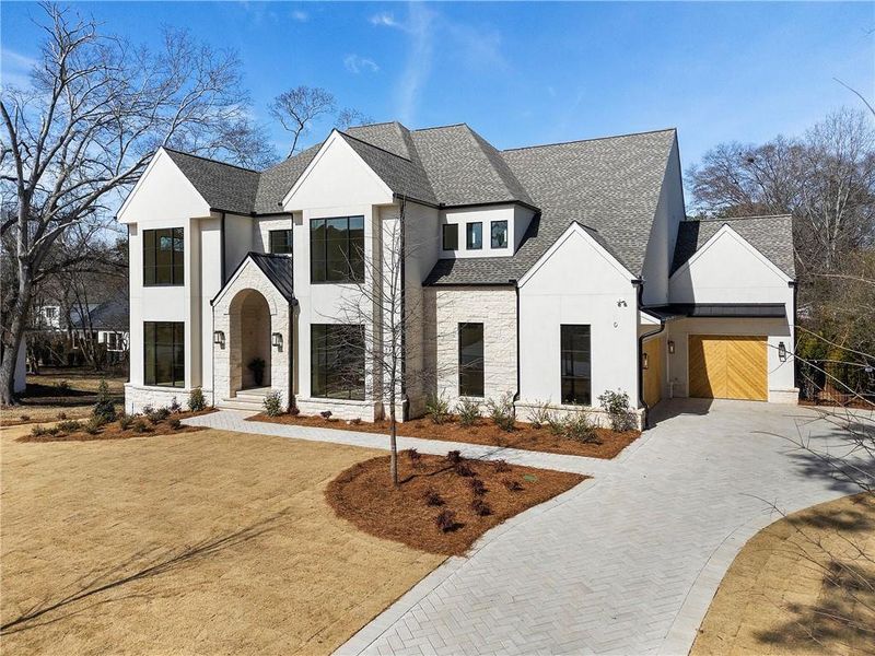 Front exterior of a new home in , Alpharetta, GA, highlighting curb appeal (Image 2). Front exterior of a new home in , Alpharetta, GA, highlighting curb appeal (Image 2).