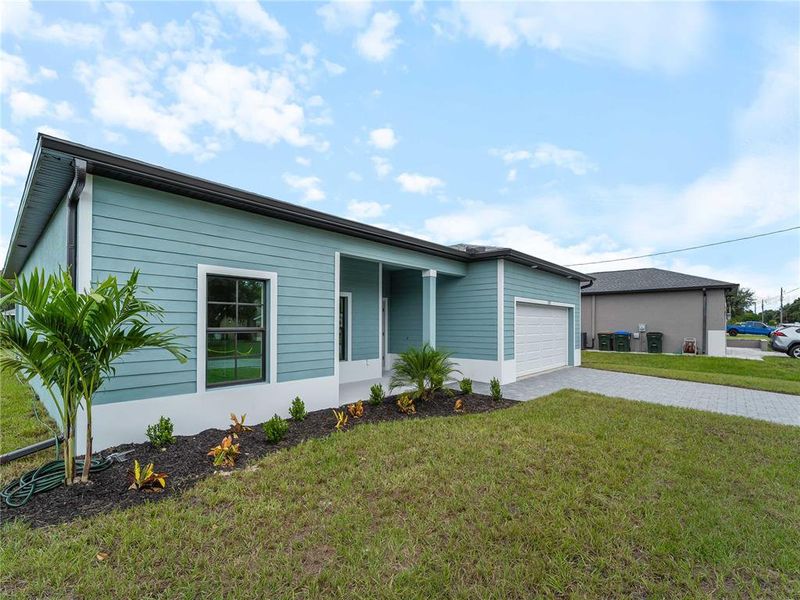Exterior details and patio area of a home in , North Port (Image 21).
