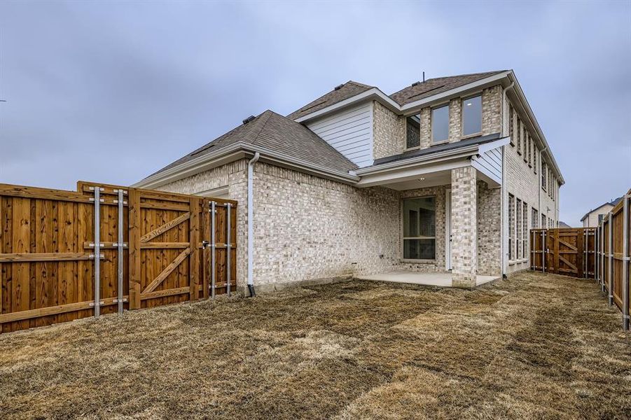 Exterior details and patio area of a home in Mosaic 40s, Celina (Image 20).