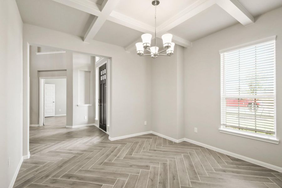 Elegant dining room with decorative ceiling feature