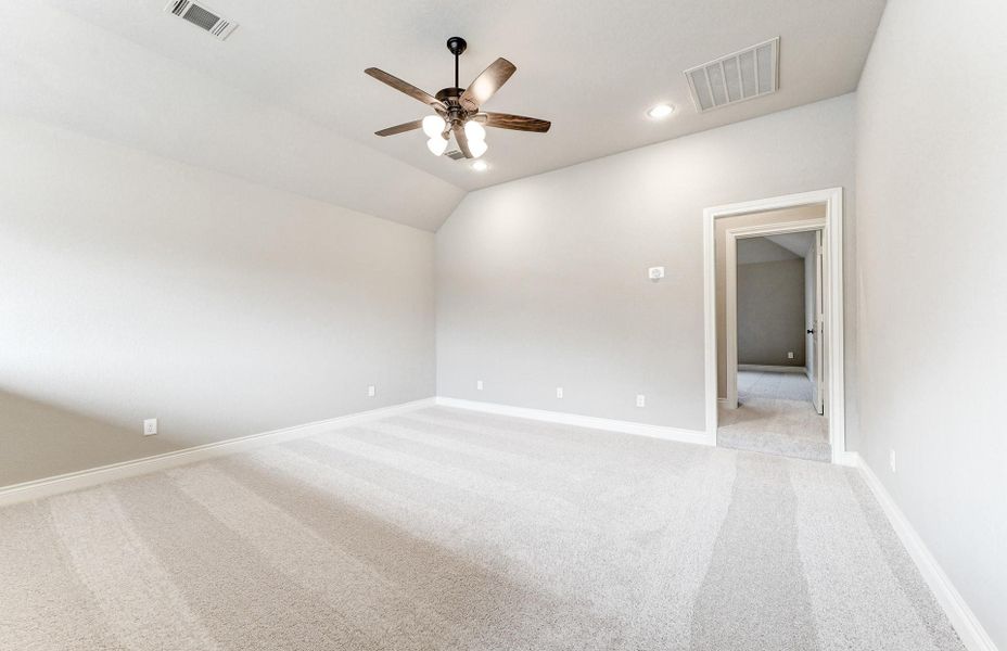 Spacious, unfurnished interior of a new home in The Woodlands Hills 65′, Willis (Image 42).