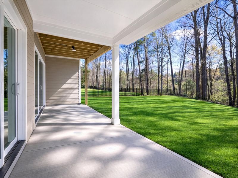 Exterior details and patio area of a home in North Creek Village, Huntersville (Image 3).