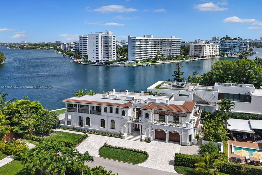 Front exterior of a new home in , Surfside, FL, highlighting curb appeal (Image 24).