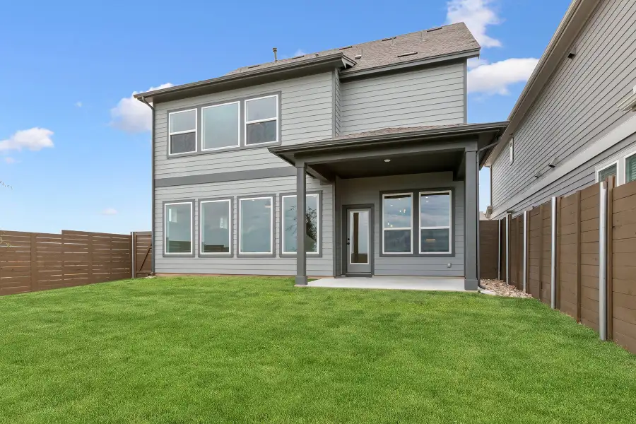Exterior details and patio area of a home in Double Creek Crossing – Classic Series, Round Rock (Image 3).