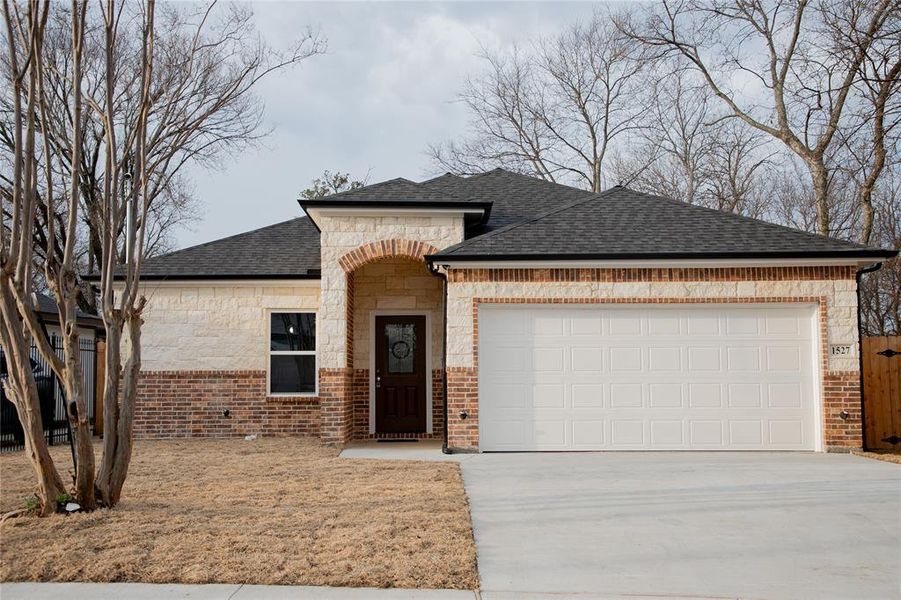 Front exterior of a new home in , Dallas, TX, highlighting curb appeal (Image 2). Front exterior of a new home in , Dallas, TX, highlighting curb appeal (Image 2).