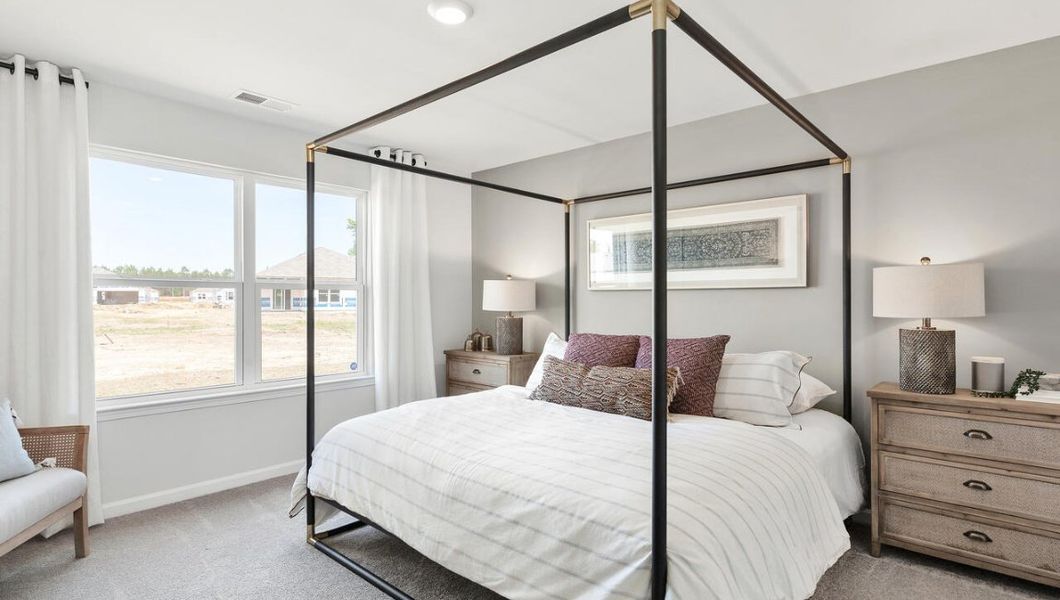 Representative furnished interior of a home built from the KERRY by D.R. Horton in Morford, Jackson (Image 11).