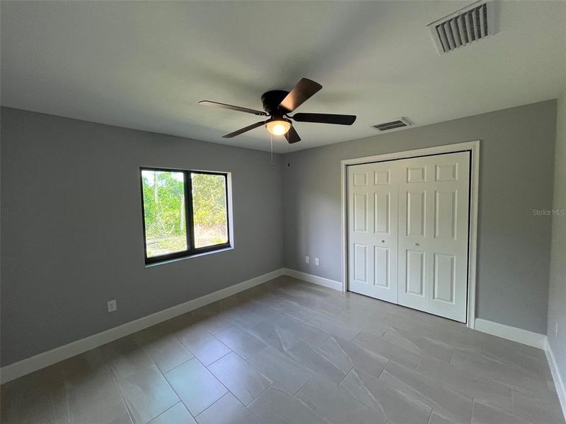 Spacious, unfurnished interior of a new home in , Port Charlotte (Image 11).
