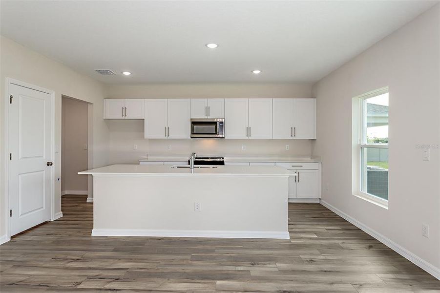 Furnished interior view inside a new home in Scenic Terrace, Haines City (Image 34).