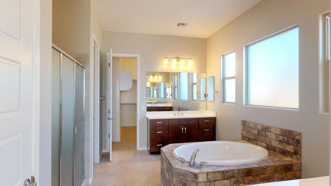 Representative furnished interior of a home built from the Benissa by DRB Homes in Windrose, Waddell (Image 13).