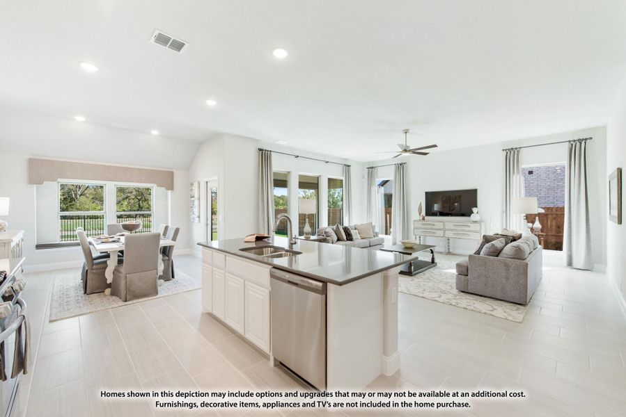 Open-concept living area with kitchen island, dining space, and living room with ceiling fan and large windows Open-concept living area with kitchen island, dining space, and living room with ceiling fan and large windows