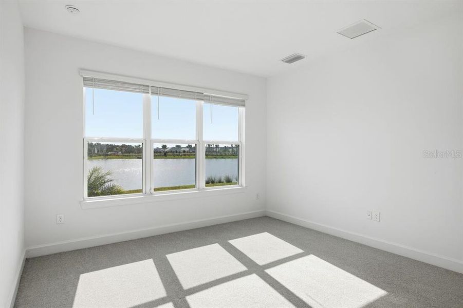 Spacious, unfurnished interior of a new home in Esplanade at Westview, Kissimmee (Image 15).