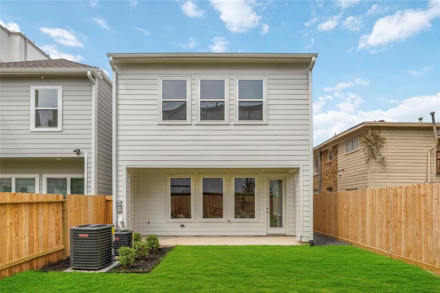 Step outside to your wide, covered porch, overlooking a generously sized, fully sodded yard, enclosed by a cedar privacy fence for moments of peaceful solitude.
