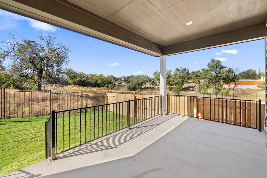 Exterior details and patio area of a home in Lariat, Liberty Hill (Image 4).