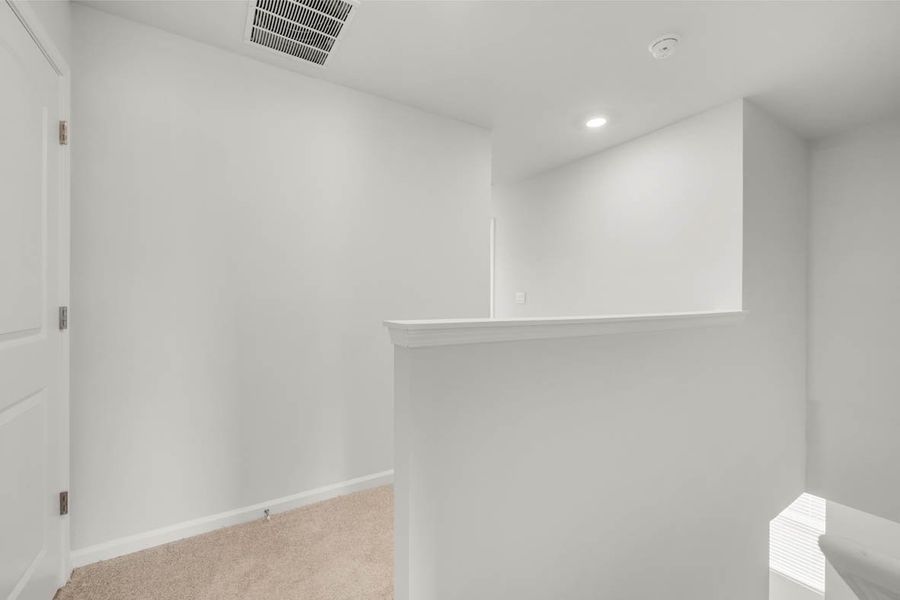 Representative unfurnished interior of a home built from the Sudbury by D.R. Horton in Laurel Park Townhomes, Hephzibah (Image 23).