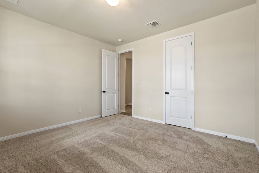 Representative unfurnished interior of a home built from the Texoma by Ashton Woods in The Colony 50s, Bastrop (Image 27).