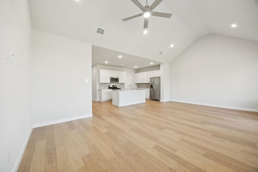 Open Floor Plan in the Masters home plan by Trophy Signature Homes – REPRESENTATIVE PHOTO