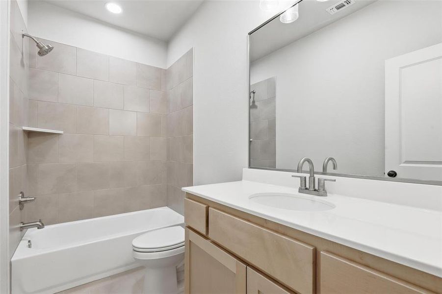 Bathroom with shower / tub combination and vanity Bathroom with shower / tub combination and vanity