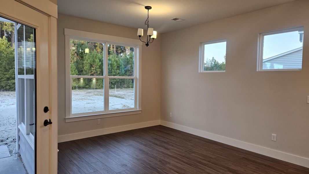 Spacious, unfurnished interior of a new home in The Enclave at French Quarter Creek, Huger (Image 14).