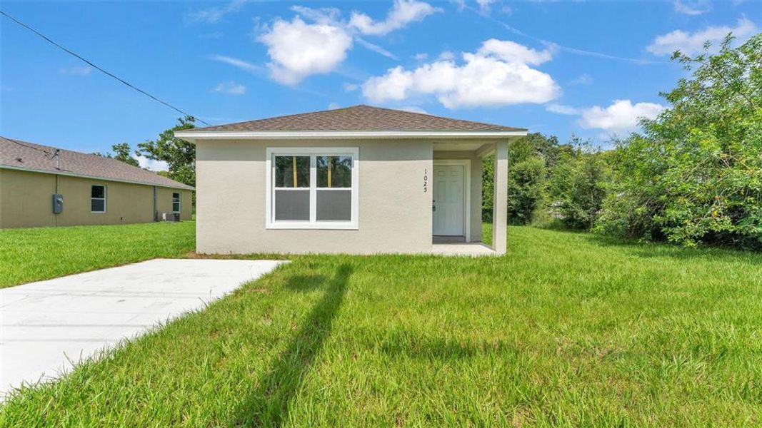 Front exterior of a new home in , Lakeland, FL, highlighting curb appeal (Image 18). Front exterior of a new home in , Lakeland, FL, highlighting curb appeal (Image 18).
