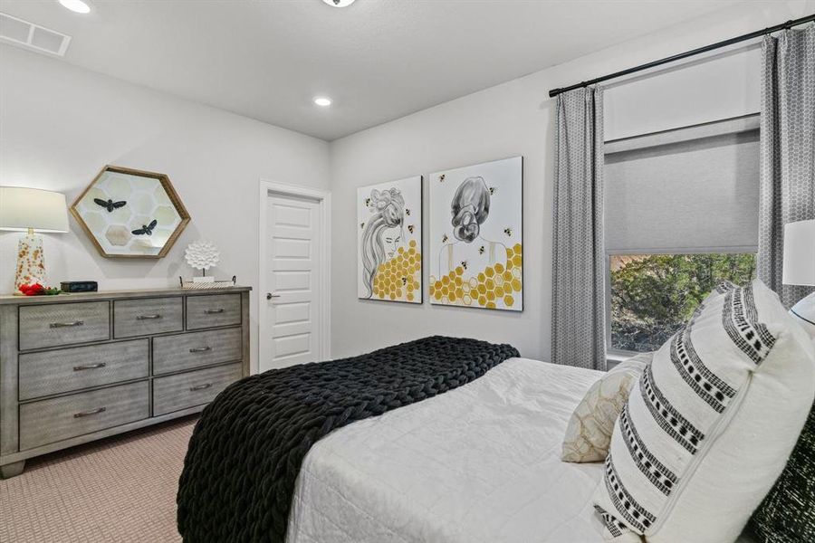 Another angle of this bedroom and its Hill Country View.