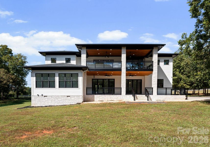 Exterior details and patio area of a home in , Statesville (Image 25).