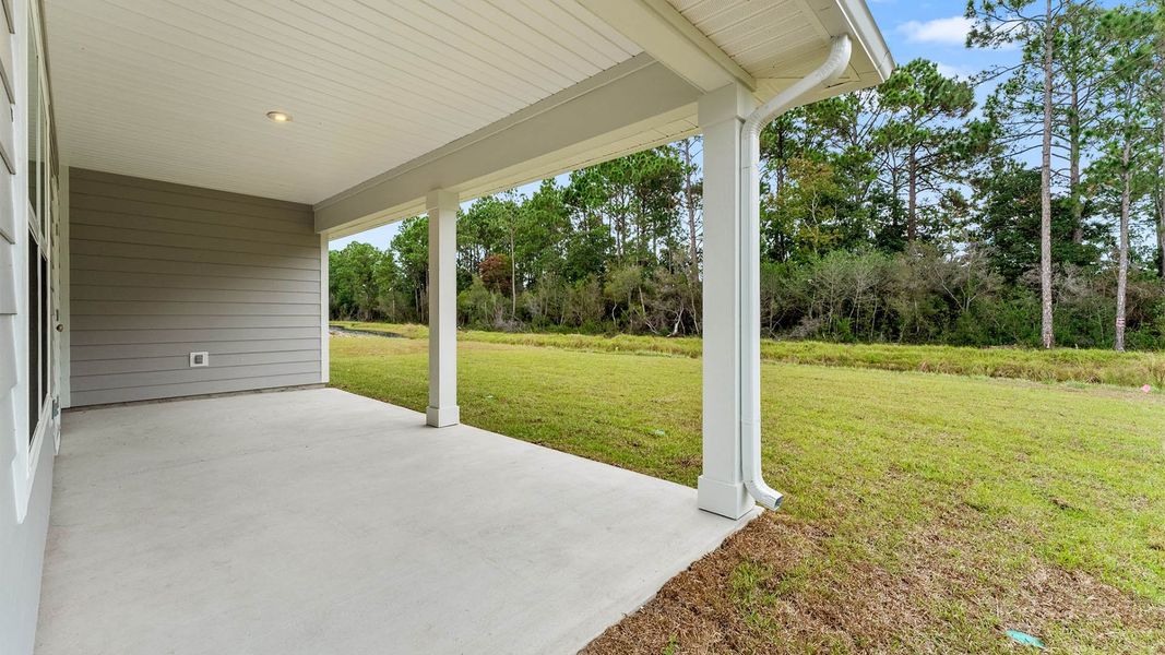 Exterior details and patio area of a home in Buffer Farms, Port Saint Joe (Image 17).