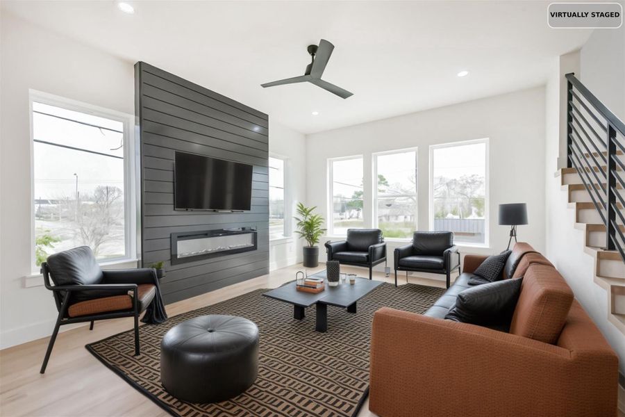 Virtually staged living room arrangement.